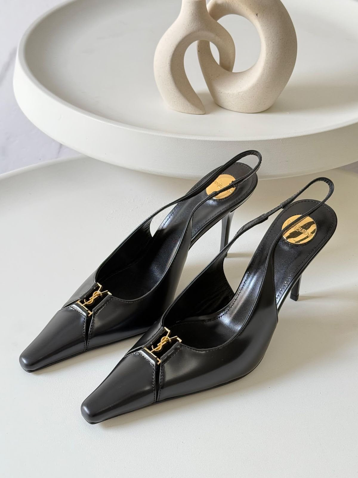 SAINT LAURENT DÈCOLLETÉ APERTE SUL RETRO